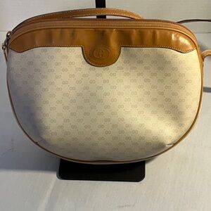 Vintage Gucci handbag with iconic interlocking G logo and classic interior